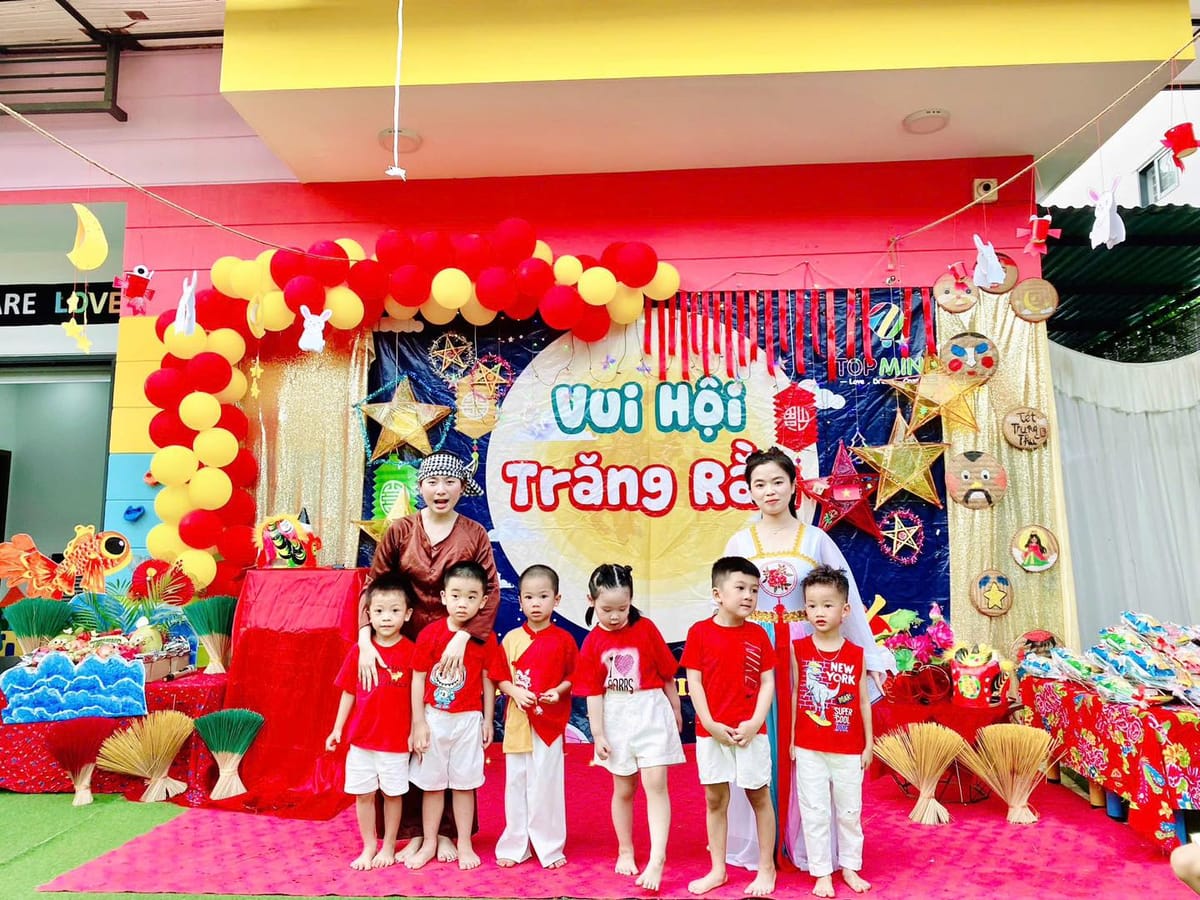 Children celebrating at a TopMind event